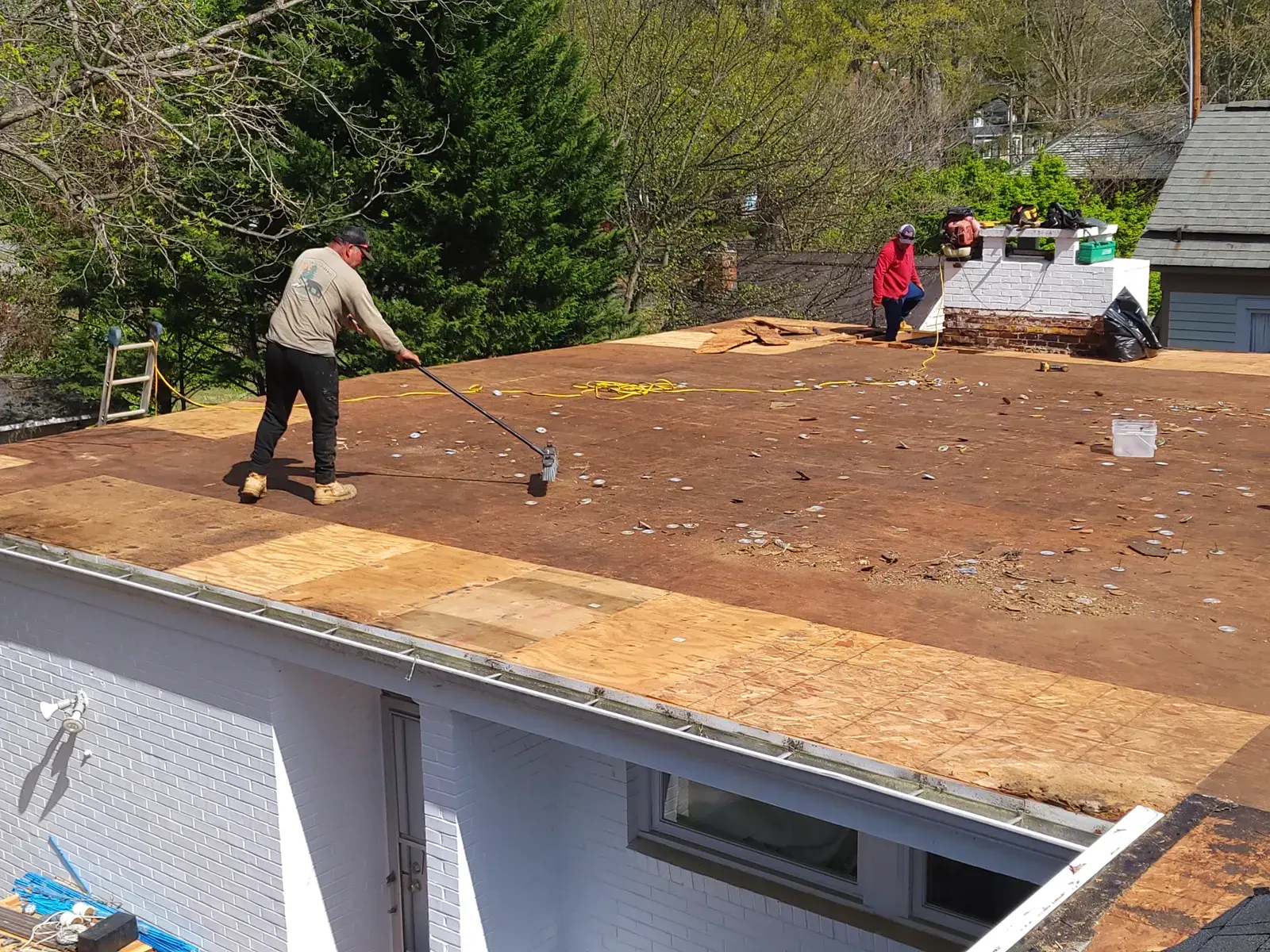Flat roof tear-off and deck prep in Louisburg NC