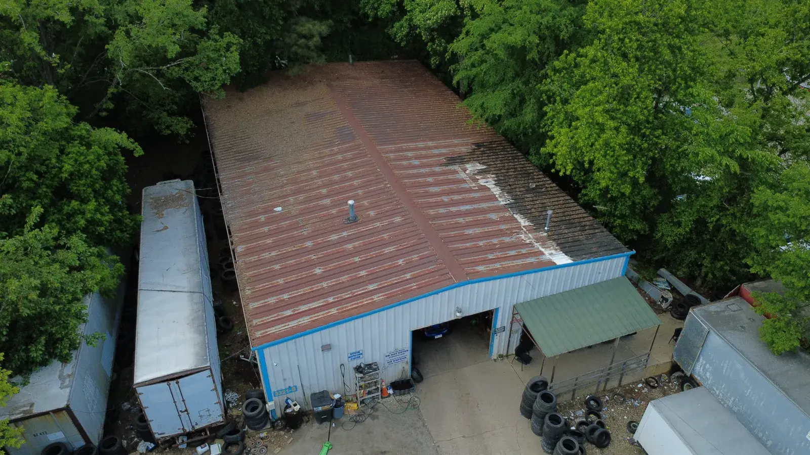 Rusty metal roof before TPO replacement in Raleigh NC