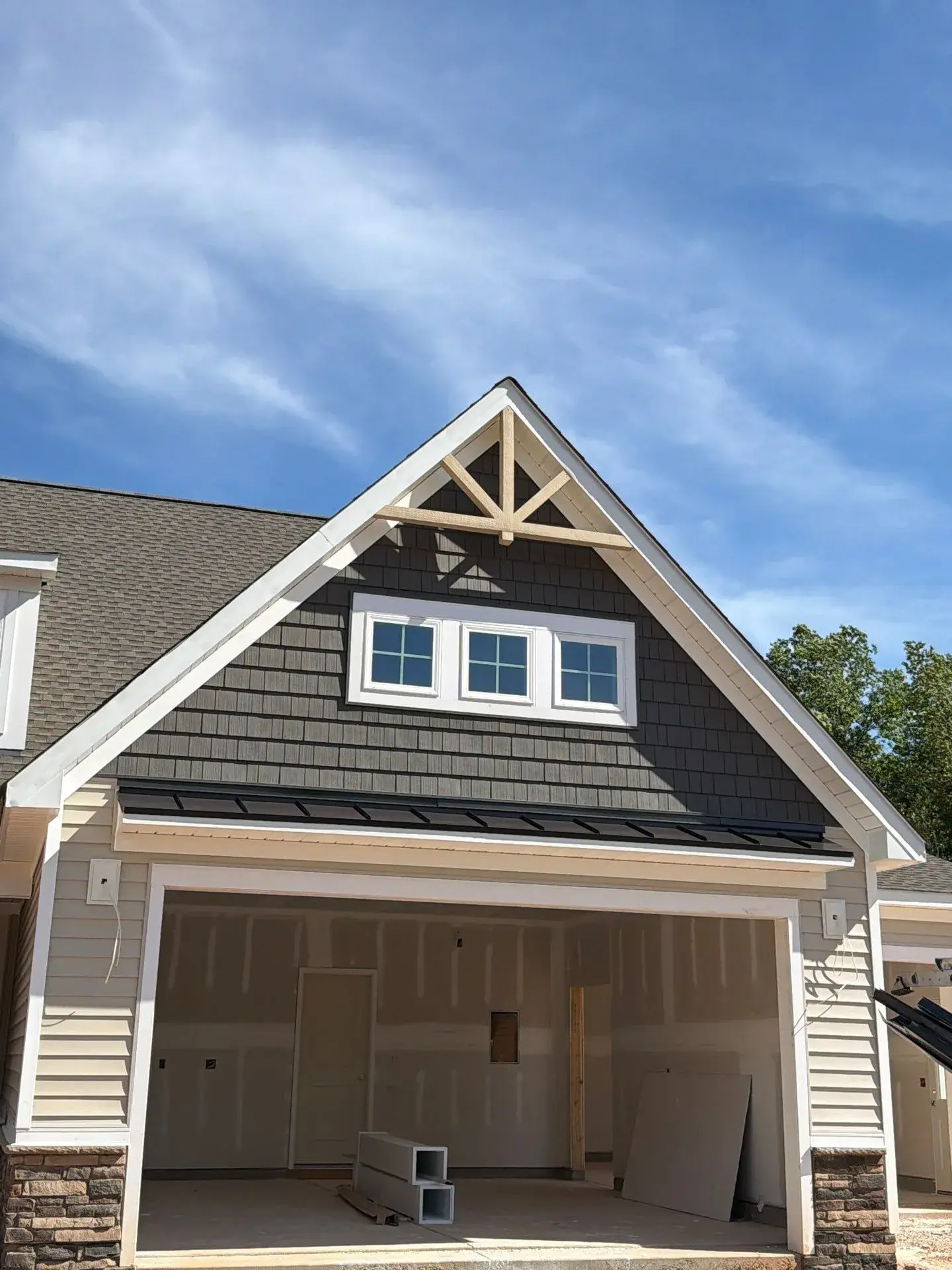 Dark bronze metal water table installation Raleigh NC