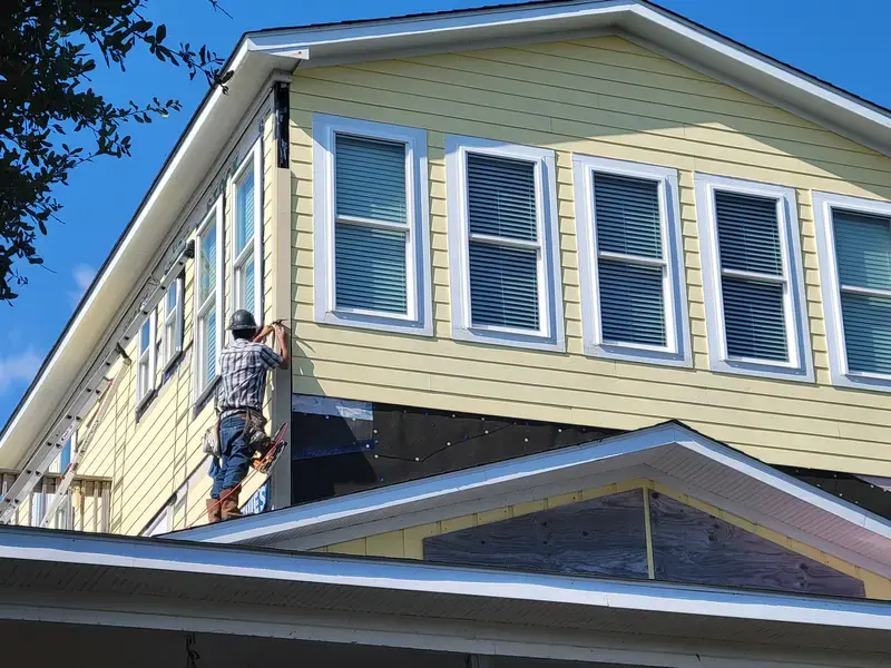 Fiber cement siding installation on upper story in NC