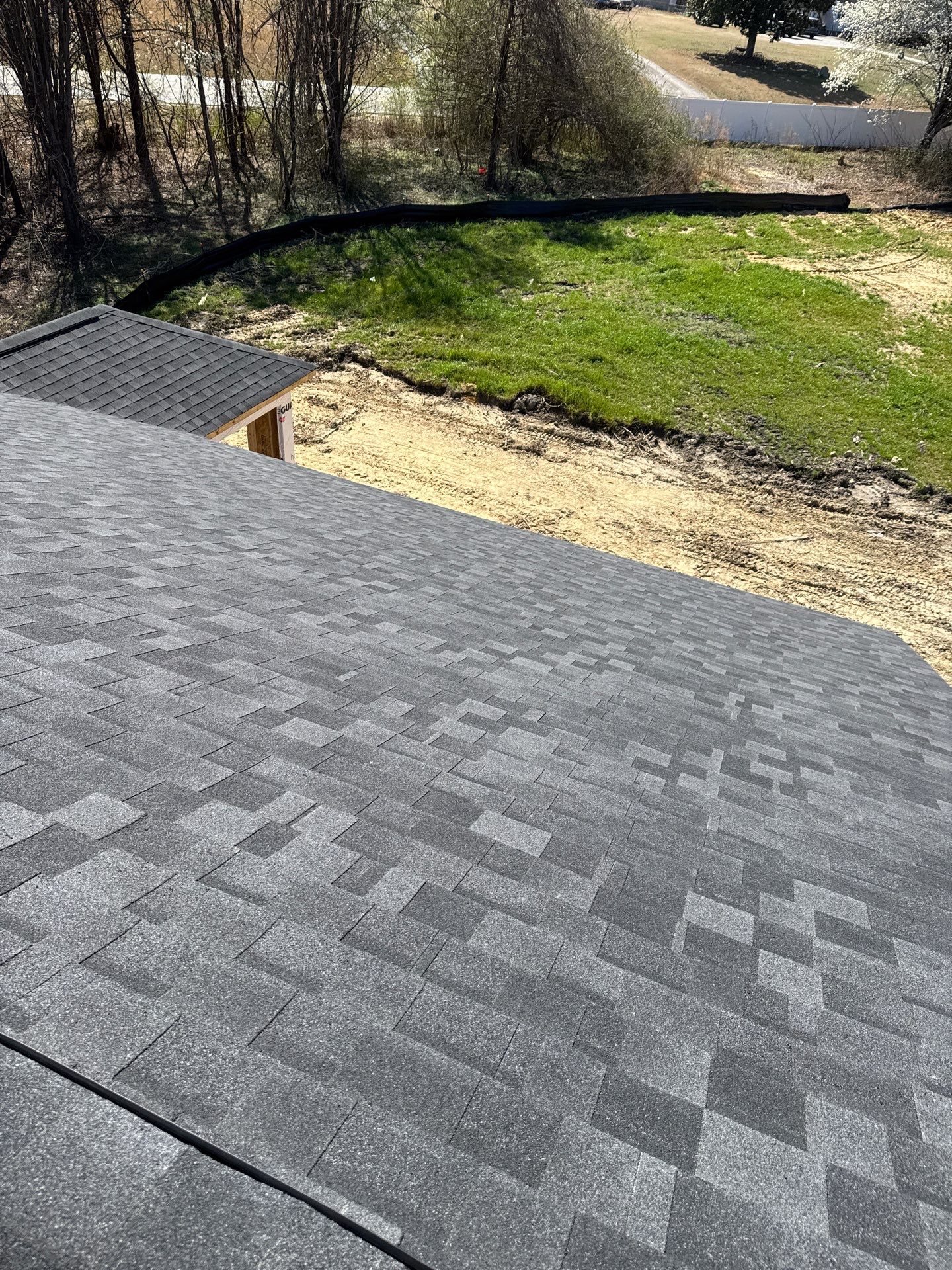 Completed architectural shingle roof on new construction home in Wendell NC