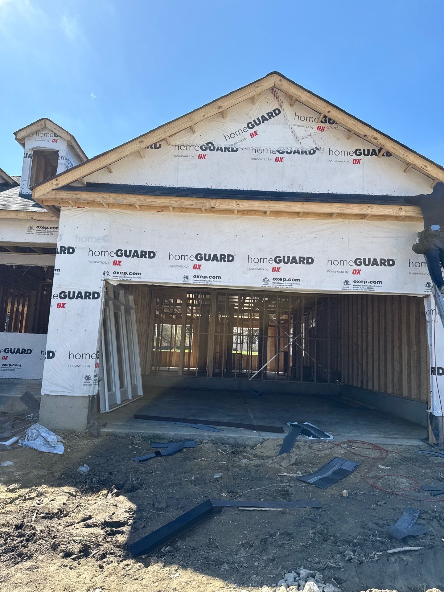 New construction home framing with house wrap in Wendell NC