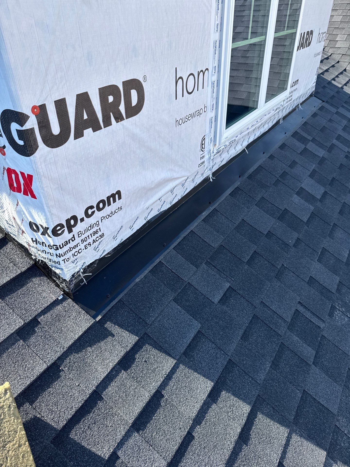 Close-up roof wall flashing detail on new construction in Fuquay-Varina NC